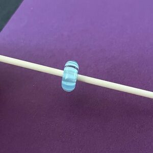 Trollbeads light blue stripe bead. TGLBE-10058.